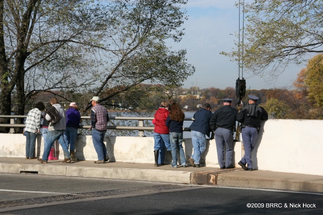 Onlookers show their support.